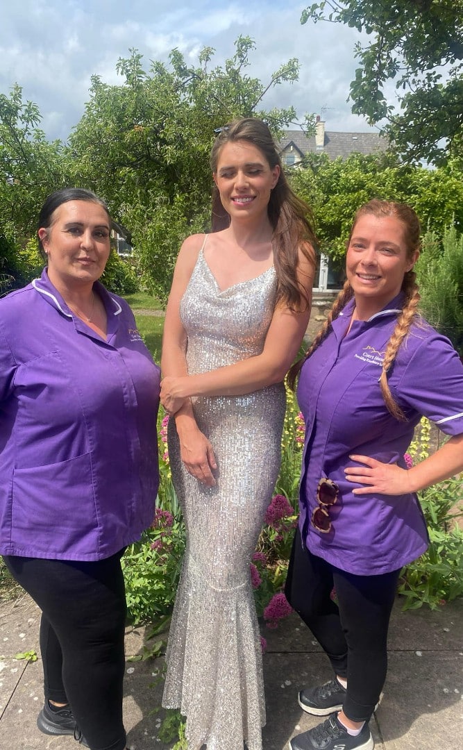 Local celebrity visits us at Court House Care Home, posing with two of the team
